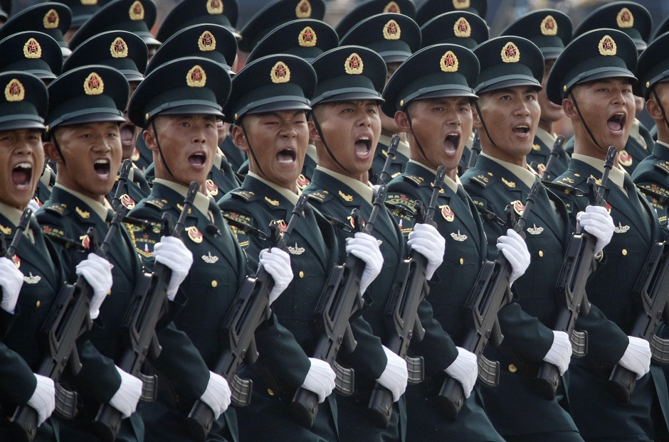  Soldiers of People's Liberation Army (PLA) march in formation past Tiananmen Square during the military parade. PHOTO: Reuters