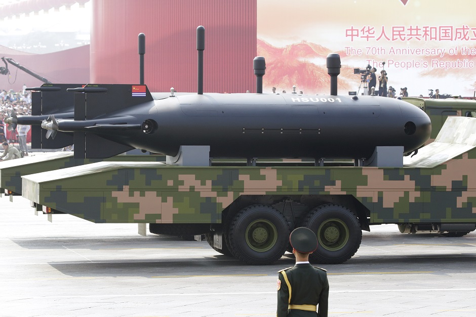  Military vehicles carrying underwater drones travel past Tiananmen Square during the military parade. PHOTO: Reuters