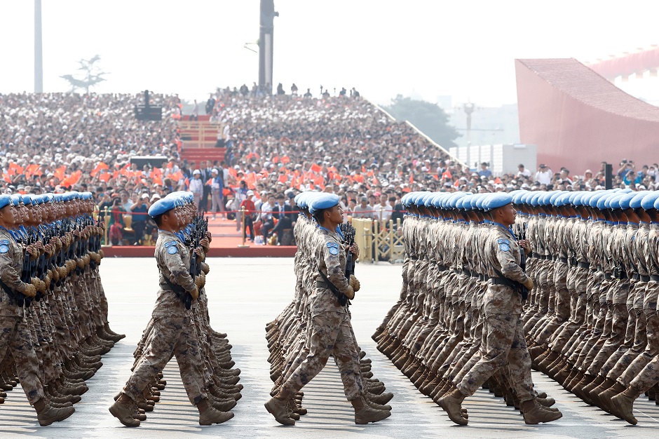  Chinese peacekeeping troops march in formation past Tiananmen Square during the military parade marking the 70th founding anniversary of People's Republic of China. PHOTO: Reuters