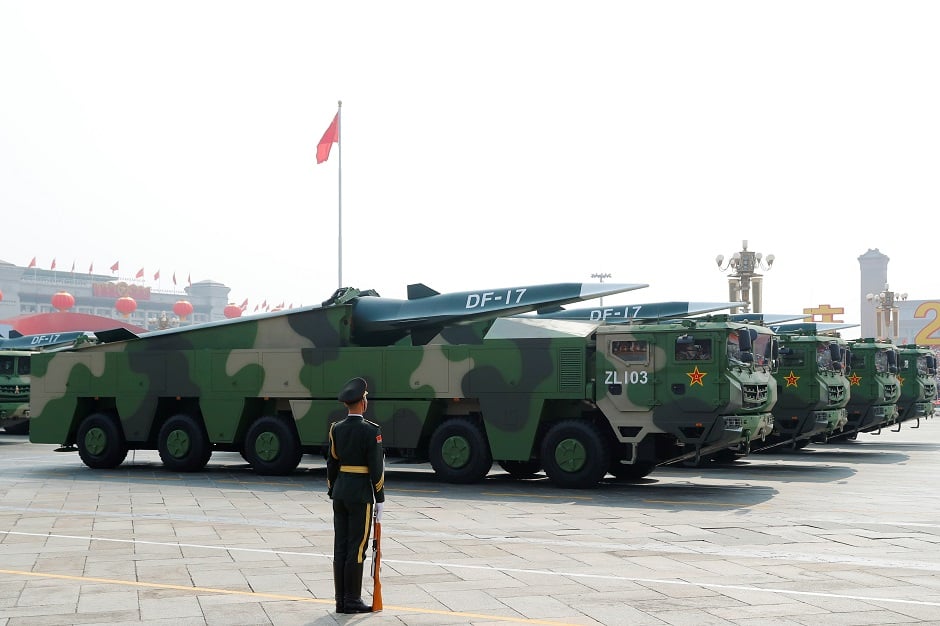 ilitary vehicles carrying hypersonic missiles DF-17 drive past Tiananmen Square during the military parade marking the 70th founding anniversary of People's Republic of China, on its National Day in Beijing, China. PHOTO: Reuters