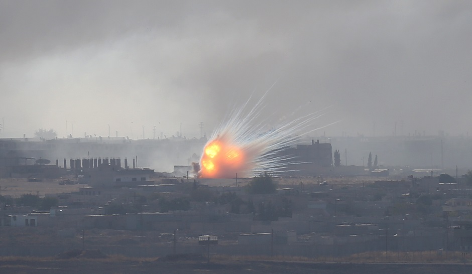 An explosion is seen over the Syrian town of Ras al-Ain. PHOTO: REUTERS