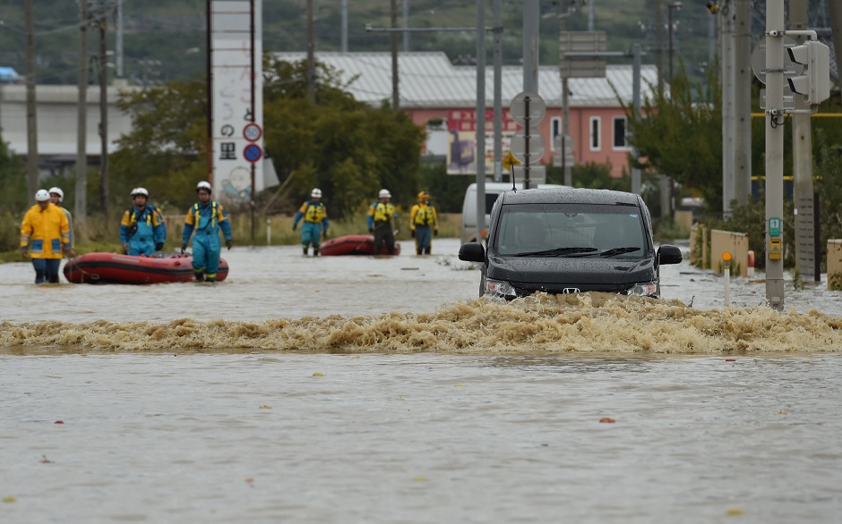 A partially submerged car is seen in the aftermath of Typhoon Hagibis. PHOTO: REUTERS