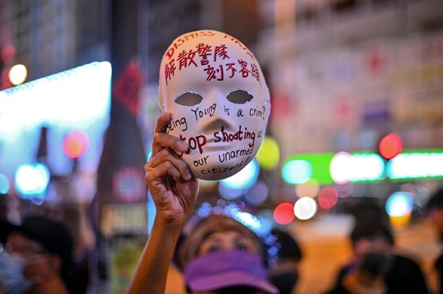 Hong Kong's leader outlawed face coverings at protests, invoking colonial-era emergency powers not used for half a century. PHOTO: AFP