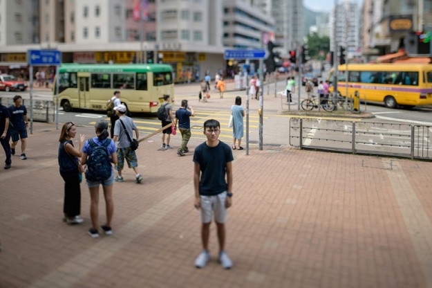 Isaac Cheng, 19, vice president of the pro-democracy Demosisto party, was beaten by three men outside his family home (Photo: AFP)