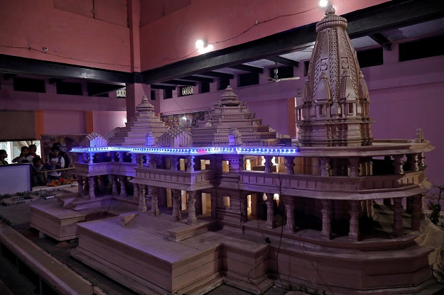 People look at a model of a proposed Ram temple that Hindu groups want to build at a disputed religious site in Ayodhya in the northern state of Uttar Pradesh, India. SOURCE: REUTERS/FILE