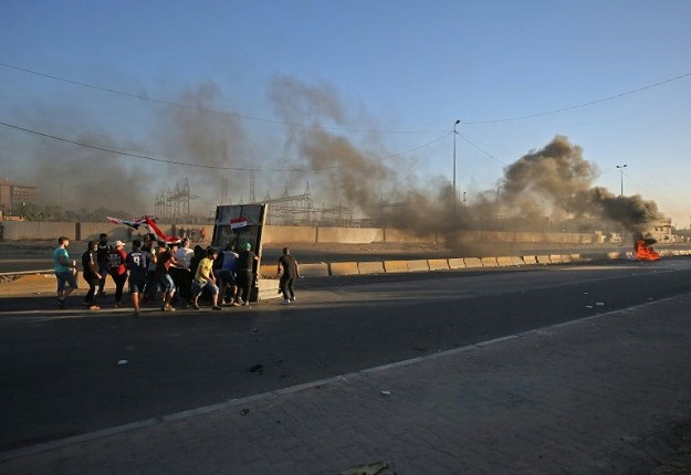 While anti-government protests in Iraq have ended for now, experts say the government has not addressed the root causes of unrest (Photo: AFP)