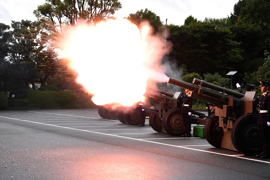 Japan Self-Defense Forces fire artilleries to mark the proclamation of Japan's Emperor Naruhito's ascension to the throne at a park in Tokyo. PHOTO: AFP