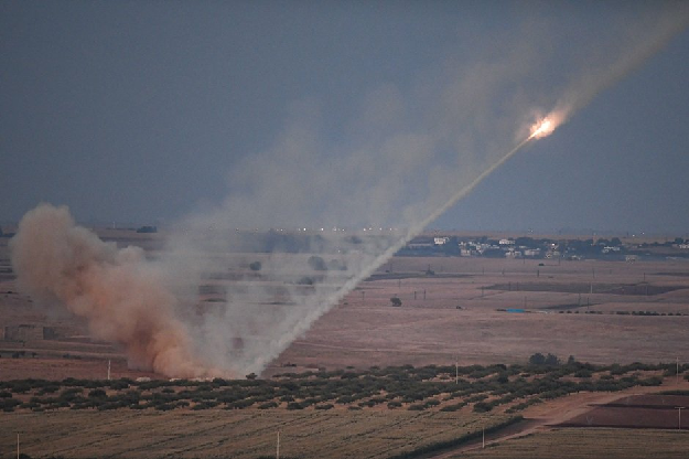 A missile fired by Turkish forces towards the Syrian town of Ras al-Ain. PHOTO: AFP
