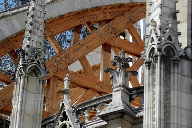 Beams are being installed to prevent arches damaged by the blaze from collapsing. PHOTO: AFP