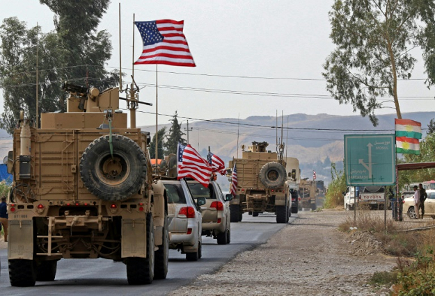US troops have been pulling out of Syria for days but some forces remain in eastern districts, where government forces have been deploying but have not yet re-established full control. PHOTO: AFP