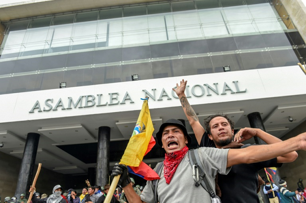 People demonstrate outside the national assembly in Quito on October 8, 2019. PHOTO: AFP