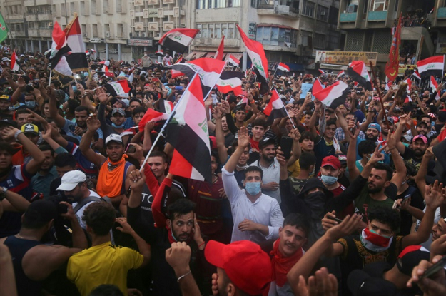 Iraqi protesters gather during an anti-government demonstration in the Iraqi capital Baghdad on October 25, 2019. PHOTO: AFP