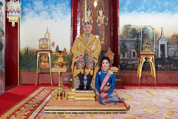 Thailand's King Maha Vajiralongkorn and General Sineenat Wongvajirapakdi, the royal consort pose at the Grand Palace in Bangkok, Thailand. PHOTO: REUTERS
