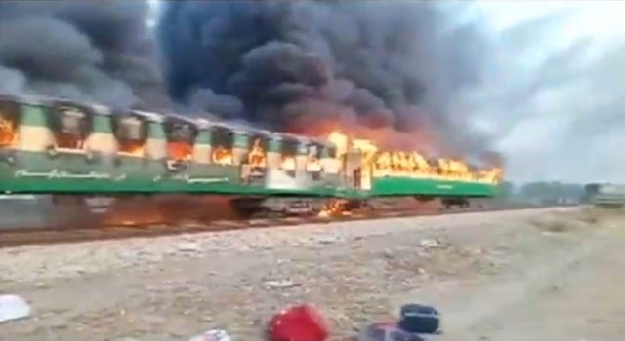 Inferno rages on the train. Photo: Reuters