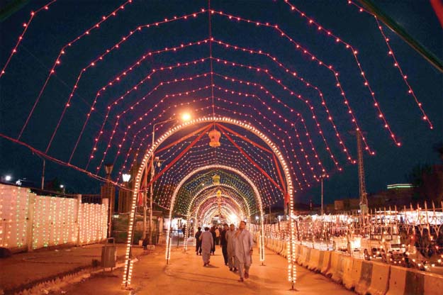 A beautiful view of the entrance to the Bari Imam Shrine in Islamabad decorated in bright colours to mark Eid Miladun Nabi. PHOTO: ONLINE 