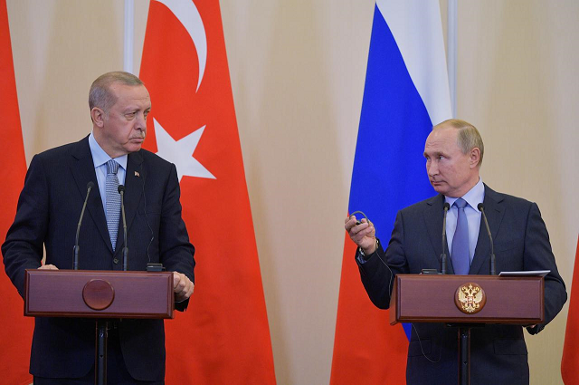 russian president vladimir putin speaks with turkish president recep tayyip erdogan during their meeting in the black sea resort of sochi russia october 22 2019 photo reuters