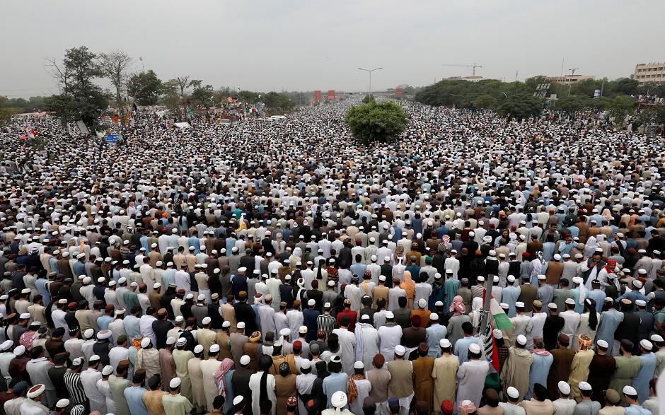 Supporters of religious and political party Jamiat Ulema-i-Islam-Fazal (JUI-F) offer Friday prayers during Azadi March. PHOTO: REUTERS