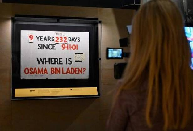 A sign made by Brooklyn residents tracking time Osama bin Laden was at large is on display. PHOTO: AFP