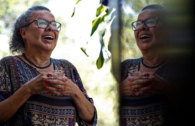 Brazilian Thais de Azevedo, 71, a transgender person who was victim of violence and had her teeth rebuilt by the project. PHOTO: AFP