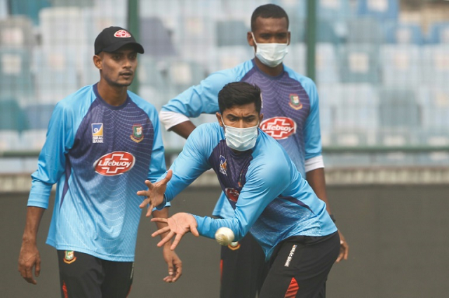 Some Bangladesh players and bowling coach Daniel Vettori trained in masks at the Arun Jaitley stadium where the Twenty20 match is to be played. PHOTO: AFP