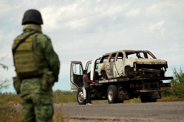 A soldier assigned to the National Guard is pictured at a checkpoint as part of an ongoing security operation by the federal government near the Mexican-American Mormon community. PHOTO: Reuters