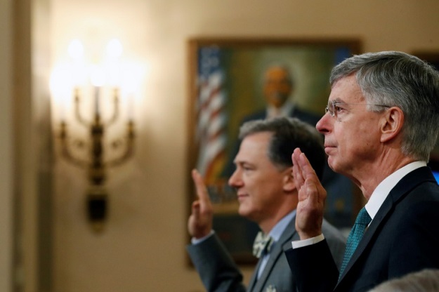 William Taylor (R), the top US diplomat in Ukraine, and career Foreign Service officer George Kent are sworn in to testify before the House impeachment inquiry.PHOTO: AFP