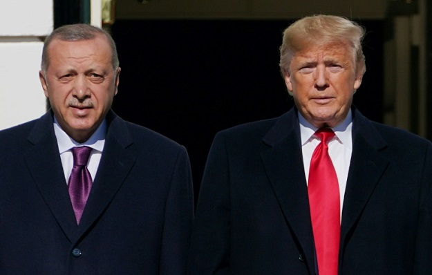US President Donald Trump met with Turkey's President Recep Tayyip Erdogan at the White House and says he was ignoring the impeachment drama.PHOTO: AFP