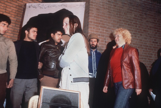 A file photo taken on November 19, 1979 shows women of the second released group of the US embassy staff in Tehran passing in front of Iranian revolutionary students who took over the US Embassy (Photo: AFP)