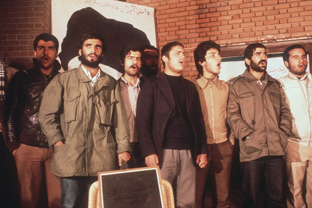 A file photo taken on November 19, 1979, shows the Iranian revolutionary students, who stormed the US Embassy in Tehran and took its staff hostage, singing as the second released group of staffers hold a press conference (Photo: AFP)