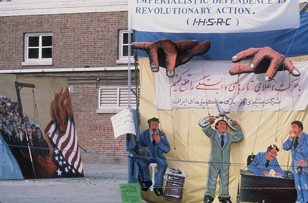 A file photo taken on November 20, 1979 shows anti-American slogans outside the US Embassy in Tehran (Photo: AFP)