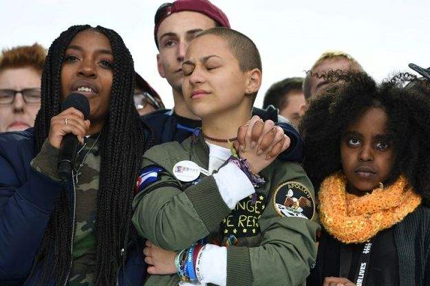 Marjory Stoneman Douglas High School student Emma Gonzalez (C) and her classmates speak during the March for Our Lives rally in Washington on March 24, 2018. PHOTO: AFP
