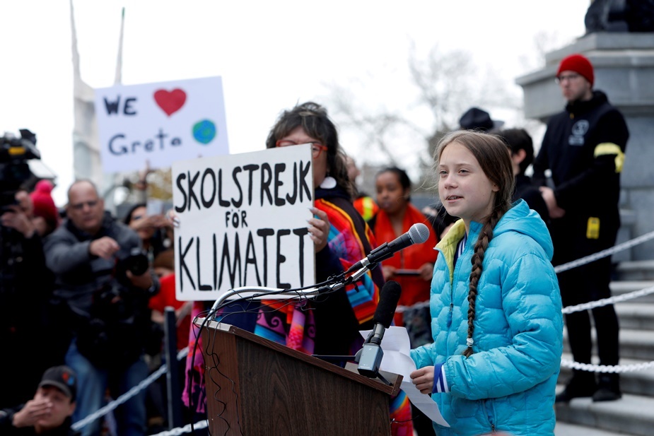 FILE PHOTO: Swedish climate change teen activist Greta Thunberg speaks during a climate strike at the Alberta Legislature in Edmonton, Alberta, Canada October 18, 2019. REUTERS/Amber Bracken/File Photo
