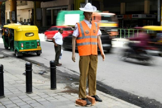 pc dummy police deploy mannequins to deter traffic offenders