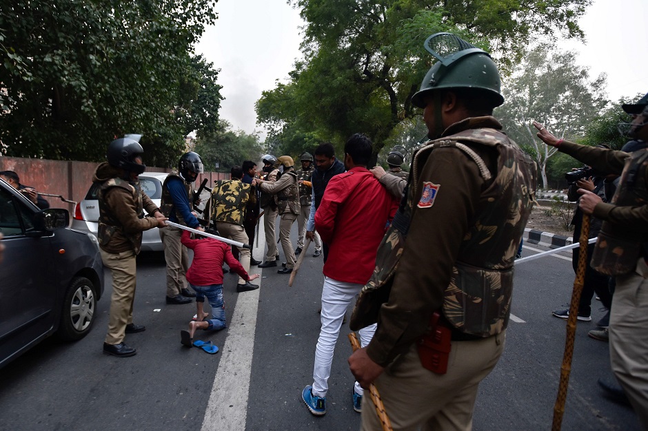 Police clash with demonstrators following a protest against the Indian government's Citizenship Amendment Bill (CAB) in New Delhi. PHOTO: AFP 