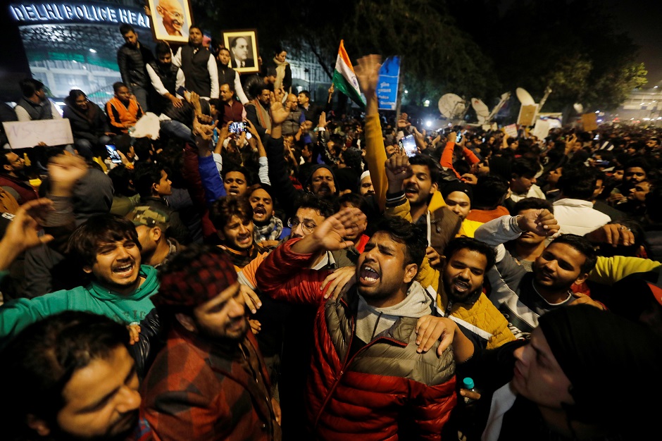 Demonstrators protesting outside police headquarters. PHOTO: REUTERS 