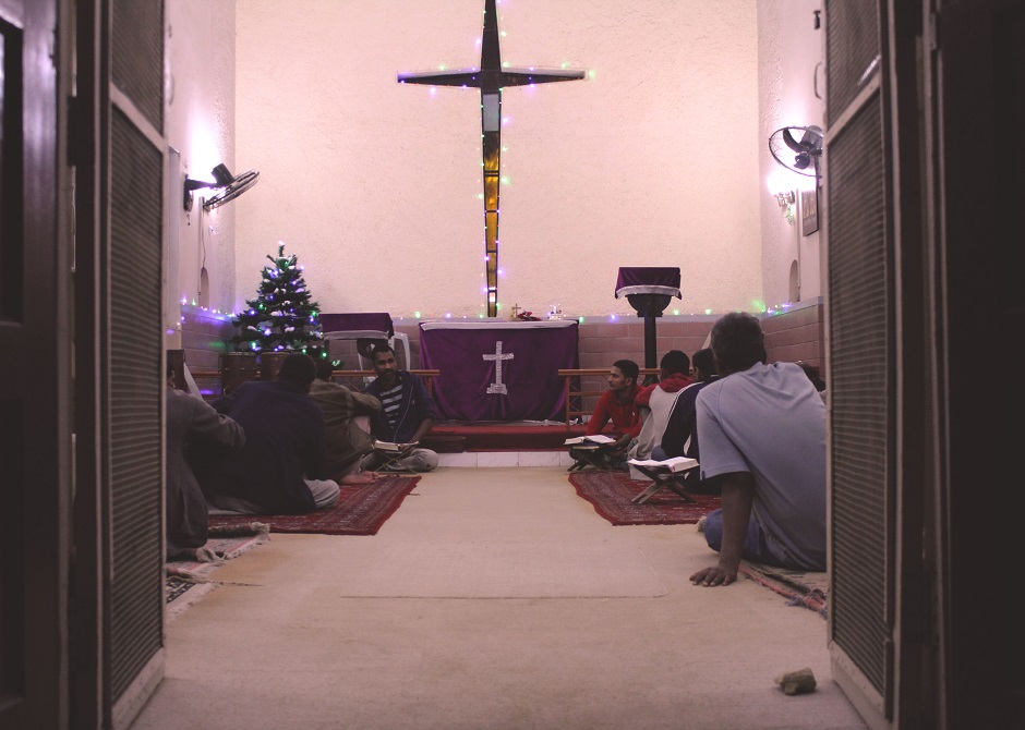 Patients at the rehab attend evening prayer as part of faith-based healing.