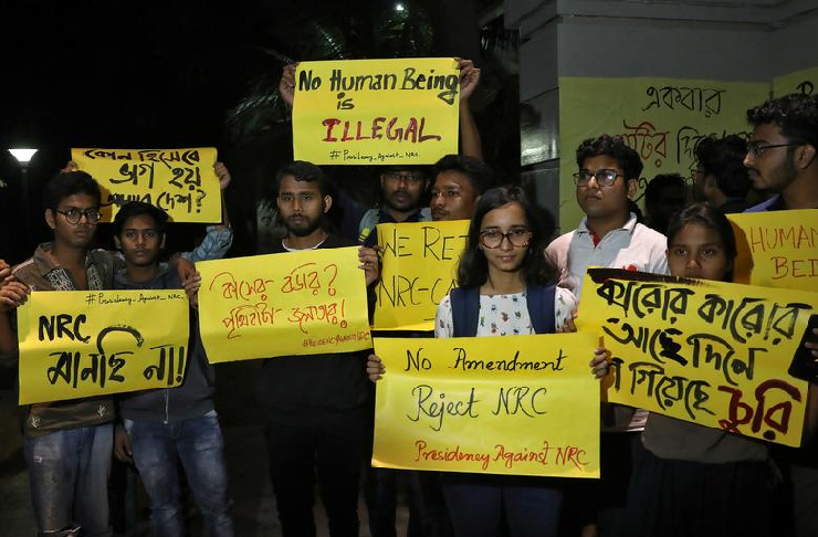 Students display placards as they attend a protest against the National Register of Citizens (NRC) and the Citizenship Amendment Bill (CAB). PHOTO: Reuters