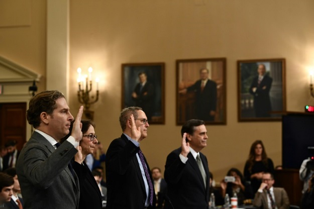 US constitutional experts take the oath of office at a House Judiciary Committee hearing on the impeachment of President Donald Trump. PHOTO: AFP