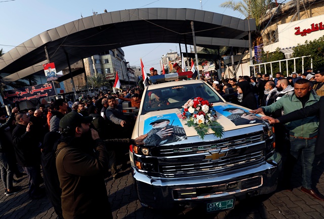 Mourners attend the funeral of the Iranian Major-General Qassem Soleimani, top commander of the elite Quds Force of the Revolutionary Guards, and the Iraqi militia commander Abu Mahdi al-Muhandis, who were killed in an air strike at Baghdad airport, in Baghdad, Iraq. PHOTO: REUTERS