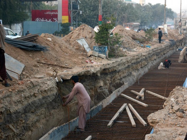 Development work for Green Line Bus Rapid Transit project being done on MA Jinnah Road in Karachi. PHOTO: FILE