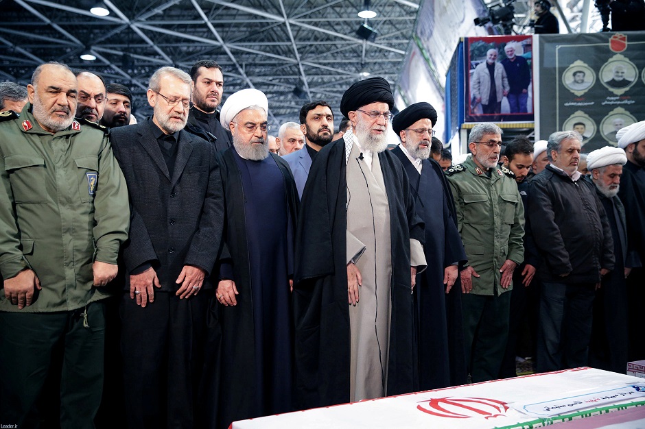 Iran's Supreme Leader Ayatollah Ali Khamenei and Iranian President Hassan Rouhani pray near the coffins of Iranian Major-General Qassem Soleimani, head of the elite Quds Force, and Iraqi militia commander Abu Mahdi al-Muhandis, who were killed in an air strike at Baghdad airport, in Tehran, Iran, January 6, 2020. PHOTO: REUTERS