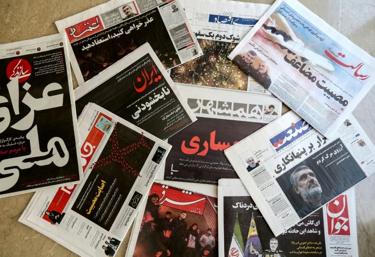 Newspapers in Iran paid tribute to those killed in the plane crash that killed 176 people on Wednesday, many of them with black front pages. PHOTO: AFP