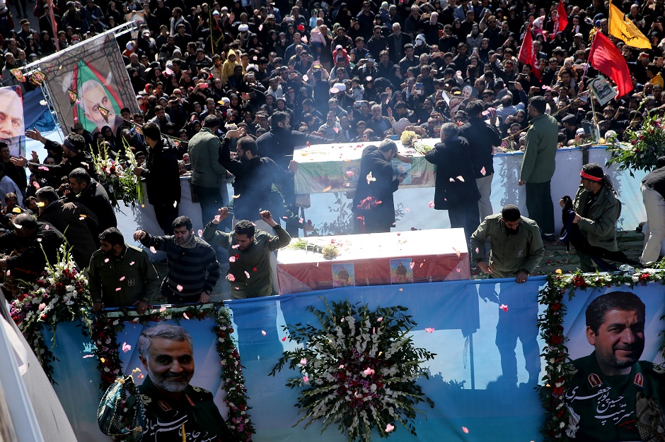 Iranian people attend a funeral procession and burial for Iranian Major-General Qassem Soleimani, head of the elite Quds Force, who was killed in an air strike at Baghdad airport, at his hometown in Kerman. PHOTO: Reuters