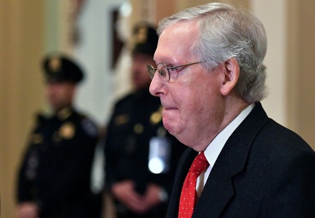 Republican Senate Majority Leader Mitch McConnell proposed impeachment trial rules calling for each side to have 24 hours over three days to present their arguments. PHOTO: AFP