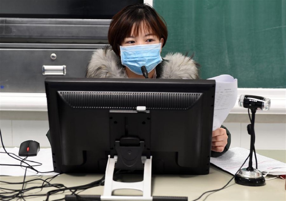 Chinese teacher Yu Ying gives an online tuition to students at Hefei No. Eight Senior High School in Hefei, east China's Anhui Province, Feb. 3, 2020. PHOTO: XINHUA