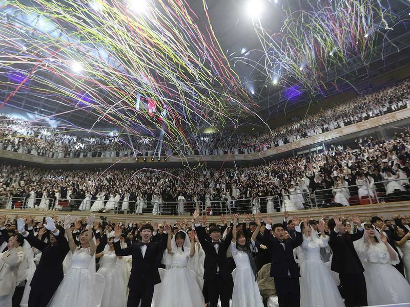 Couples from around the world celebrate in a mass wedding ceremony at the Cheong Shim Peace World Center in Gapyeong, South Korea. Image Credit: AP