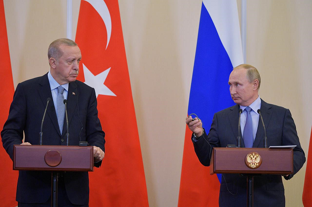 russian president vladimir putin speaks with turkish president recep tayyip erdogan during their meeting in the black sea resort of sochi russia october 22 2019 photo reuters file