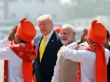 U.S. President Donald Trump is welcomed by Indian Prime Minister Narendra Modi as he arrives at Sardar Vallabhbhai Patel International Airport in Ahmedabad, India February 24, 2020. PHOTO: REUTERS.