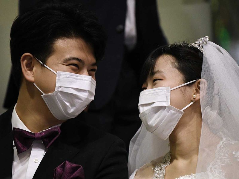 Nearly 6,000 identical-dressed couples from 64 countries - many of whom met for the first time in recent weeks - married in Gapyeong, a festive mood filling the venue as newlyweds took group photos and were congratulated by friends and relatives. Image Credit: AFP