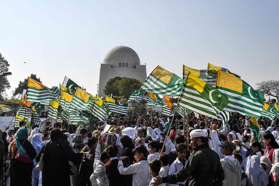 Protesters hold Kashmiri flags as they gather in front of the mausoleum of Pakistan's founder Muhammad Ali Jinnah during a demonstration to mark Kashmir Solidarity Day in Karachi. PHOTO: AFP